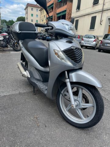 Grey scooter on a road